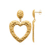 Boucles d'oreille pendantes XL Paloma, puce ovale et pendant cœur ajouré. En acier PVD doré texturé effet tweed. Présentées de face et de profil.