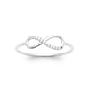 Bague Infinity serti, motif mini infini demi serti sur corps fil. Oxydes de zirconium sur argent 925 millièmes rhodié.