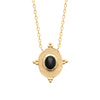 Collier Aura composé d'un motif ovale entouré de mini boules, et serti d'un cabochon ovale en agate noire, monté sur chaîne forçat diamantée. En plaqué or 750 millièmes, finition antique satinée. Zoom sur le motif.