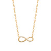 Collier ras de cou Infinity, motif infini demi serti d'oxydes de zirconium fixé sur chaîne forçat diamantée. En plaqué or 750 millièmes.