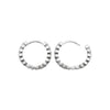 Créoles rondes diamètre 10mm, oxyde de zirconium serti sur argent. Vue de profil.