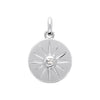 Médaille motif étoile du Nord, serti d'un oxyde de zirconium serti clos, sur bélière mobile. En argent 925 millièmes rhodié.