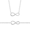 Parure collier et bracelet Infinity, motif infini demi serti d'oxydes de zirconium fixé sur chaîne forçat diamantée. En argent 925 millièmes rhodié.