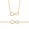 Parure collier et bracelet Infinity, motif infini demi serti d'oxydes de zirconium fixé sur chaîne forçat diamantée. En plaqué or 750 millièmes.
