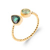 Bague composée de deux pierres synthétiques vertes, l'une ronde, l'autre de forme navette, serti perlé, montées sur corps fil plaqué or 750 millièmes.