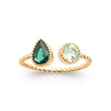Bague composée de deux pierres synthétiques vertes, l'une ronde, l'autre de forme navette, serti perlé, montées sur corps fil plaqué or 750 millièmes. Vue de dessus.